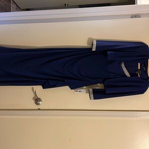 Long formal gown in Navy color with jacket with tags still on. Size 10.